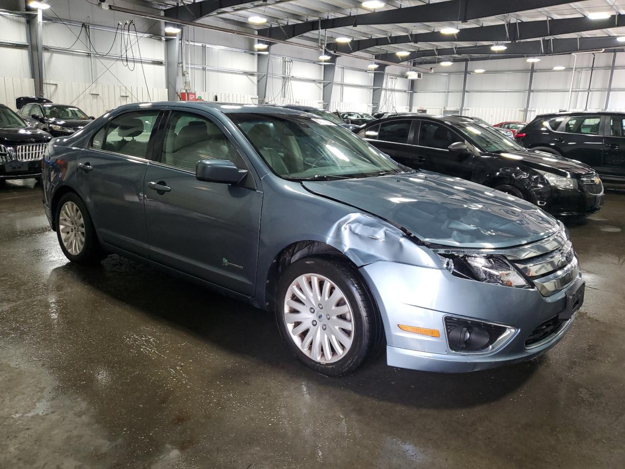 2011 Ford Fusion Hybrid VIN: 3FADP0L31BR234885 Lot: 69815454