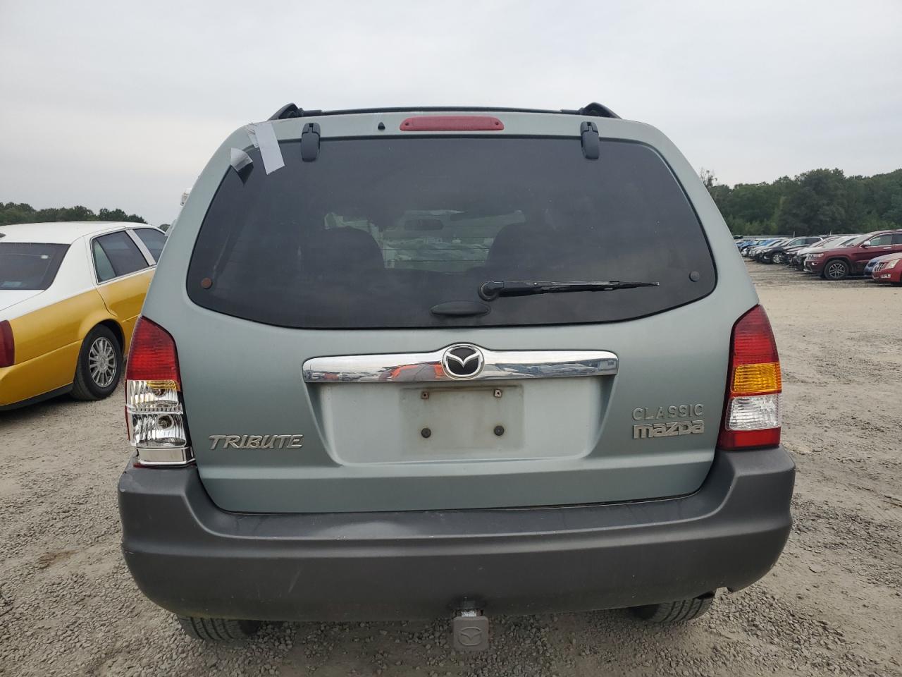 4F2CZ06144KM04030 2004 Mazda Tribute Es