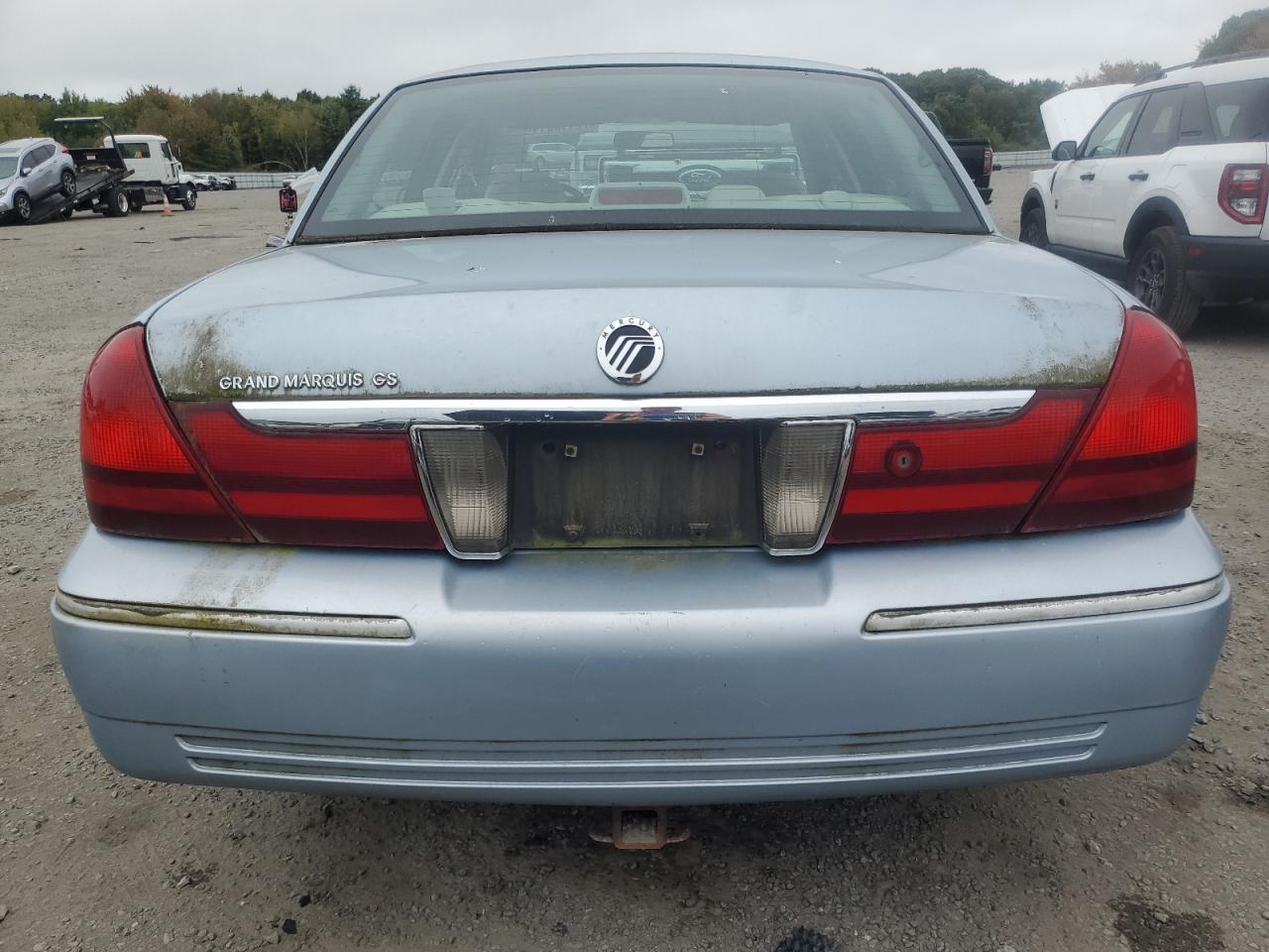 2003 Mercury Grand Marquis Gs VIN: 2MEFM74W63X704603 Lot: 72118014