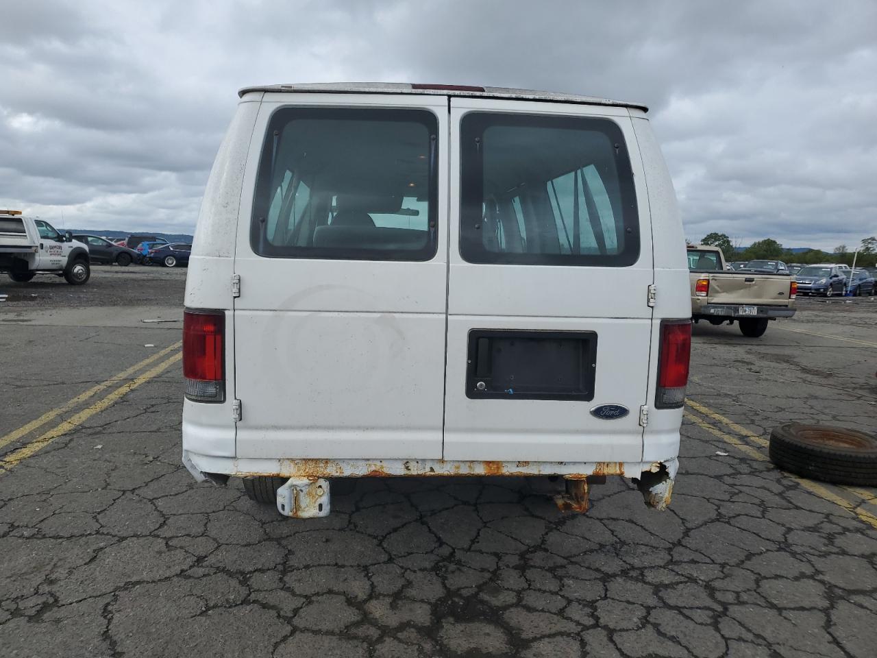 2006 Ford Econoline E350 Super Duty Wagon VIN: 1FBSS31L46DA39130 Lot: 73319284