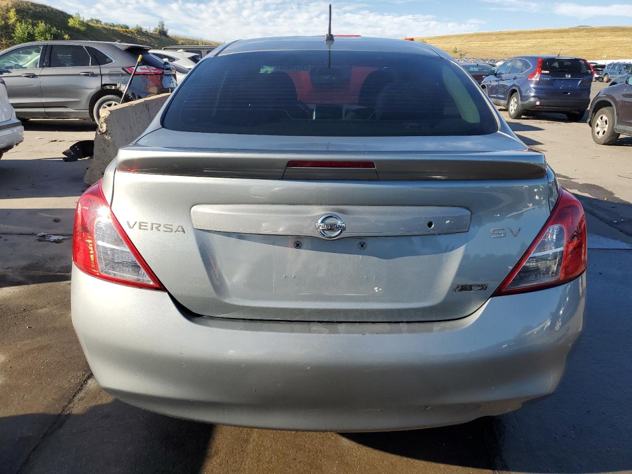 2014 Nissan Versa S VIN: 3N1CN7APXEK451202 Lot: 71176854