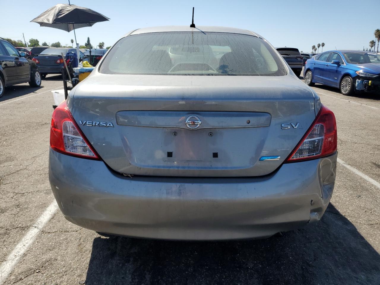 2012 Nissan Versa S VIN: 3N1CN7AP6CL800556 Lot: 69291144