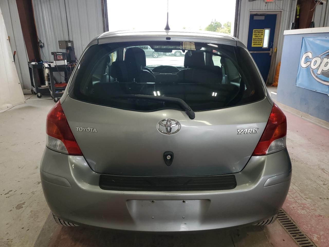 2009 Toyota Yaris VIN: JTDJT903595231034 Lot: 73575814