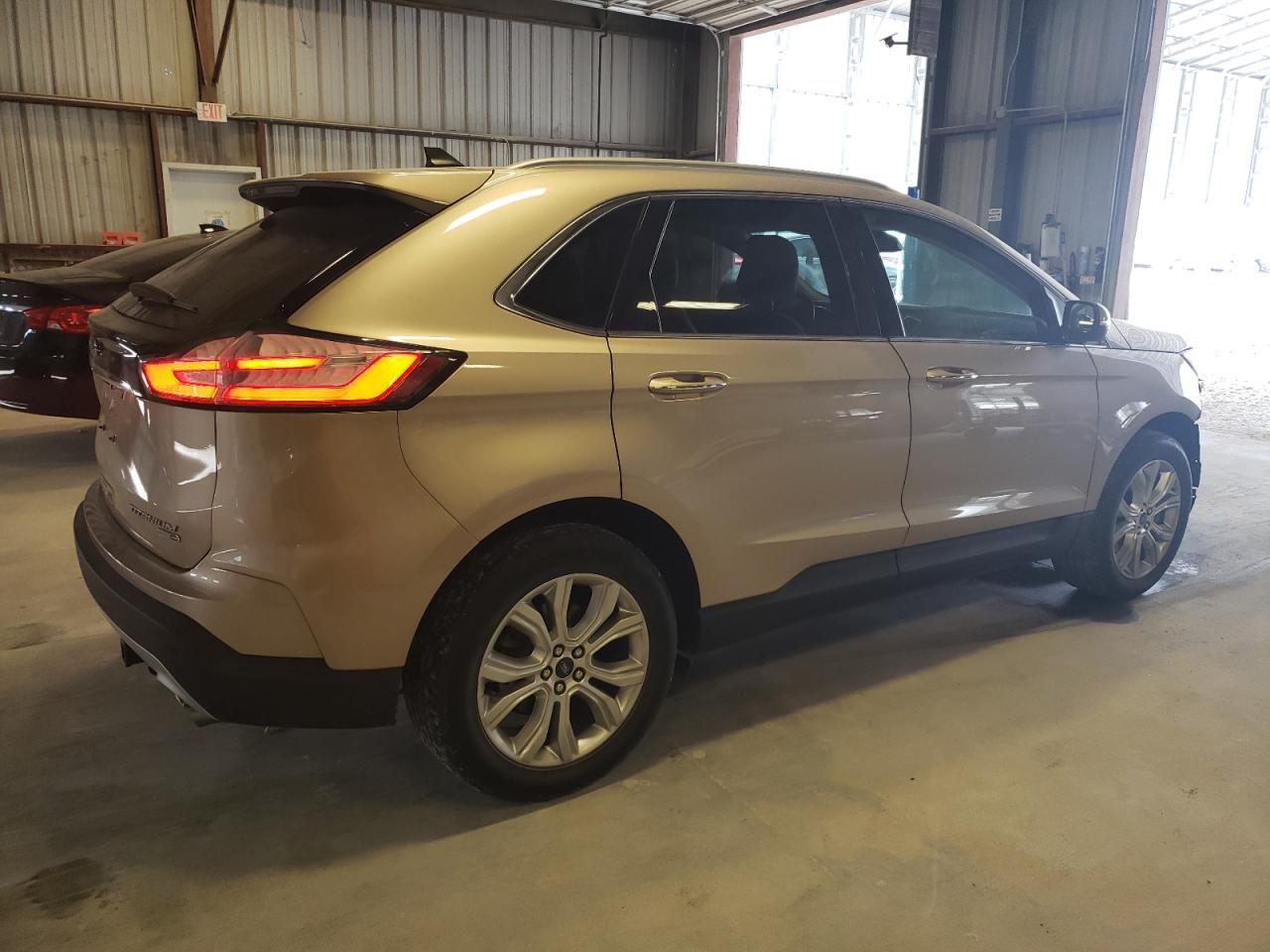 2020 Ford Edge Titanium VIN: 2FMPK4K95LBB37087 Lot: 71010714