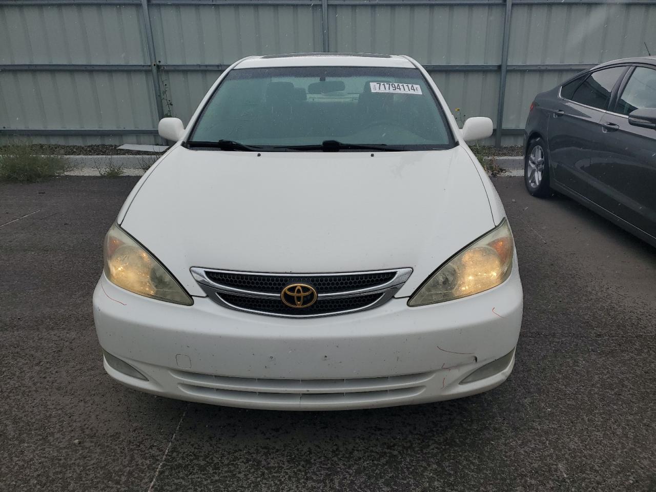 2004 Toyota Camry Le VIN: JTDBE30K940282321 Lot: 71794114