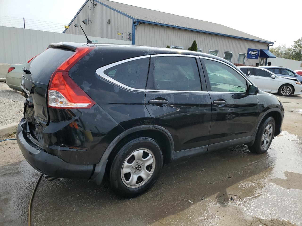 2014 Honda Cr-V Lx VIN: 2HKRM3H33EH565381 Lot: 69521814