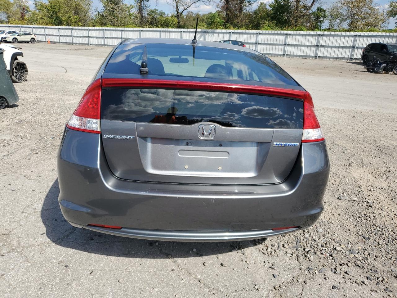 2010 Honda Insight Ex VIN: JHMZE2H7XAS002526 Lot: 71060574