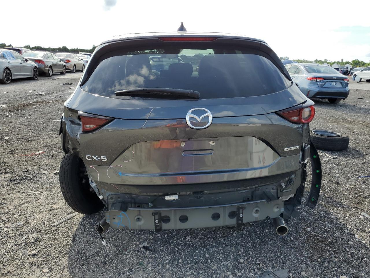 2021 Mazda Cx-5 Touring VIN: JM3KFACM3M0446541 Lot: 72647604