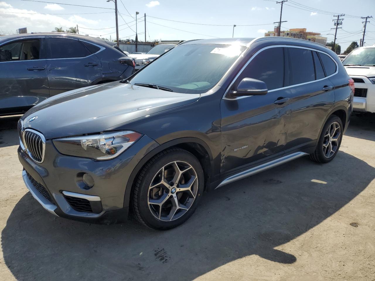 WBXHU7C39J5H44759 2018 BMW X1 - Image 1