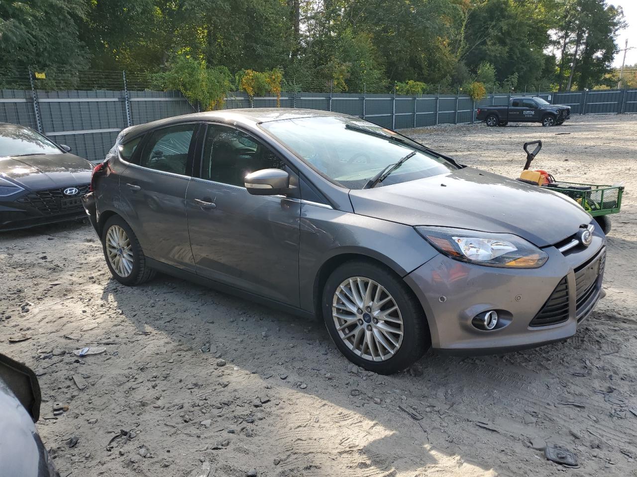 2013 Ford Focus Titanium VIN: 1FADP3N28DL103170 Lot: 71836404