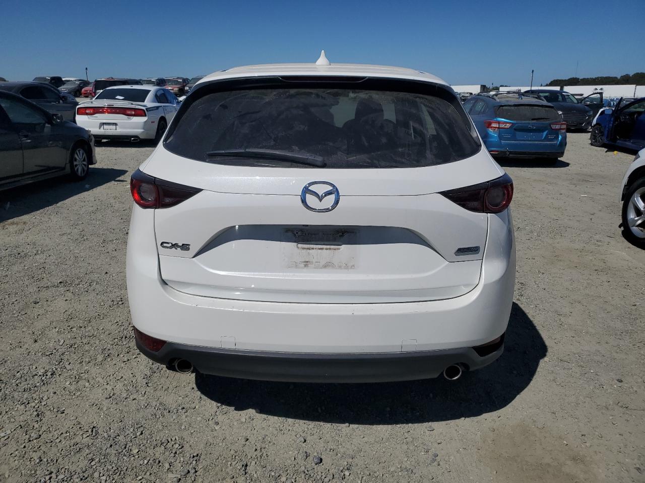 2019 Mazda Cx-5 Touring VIN: JM3KFACM3K1579808 Lot: 70715254