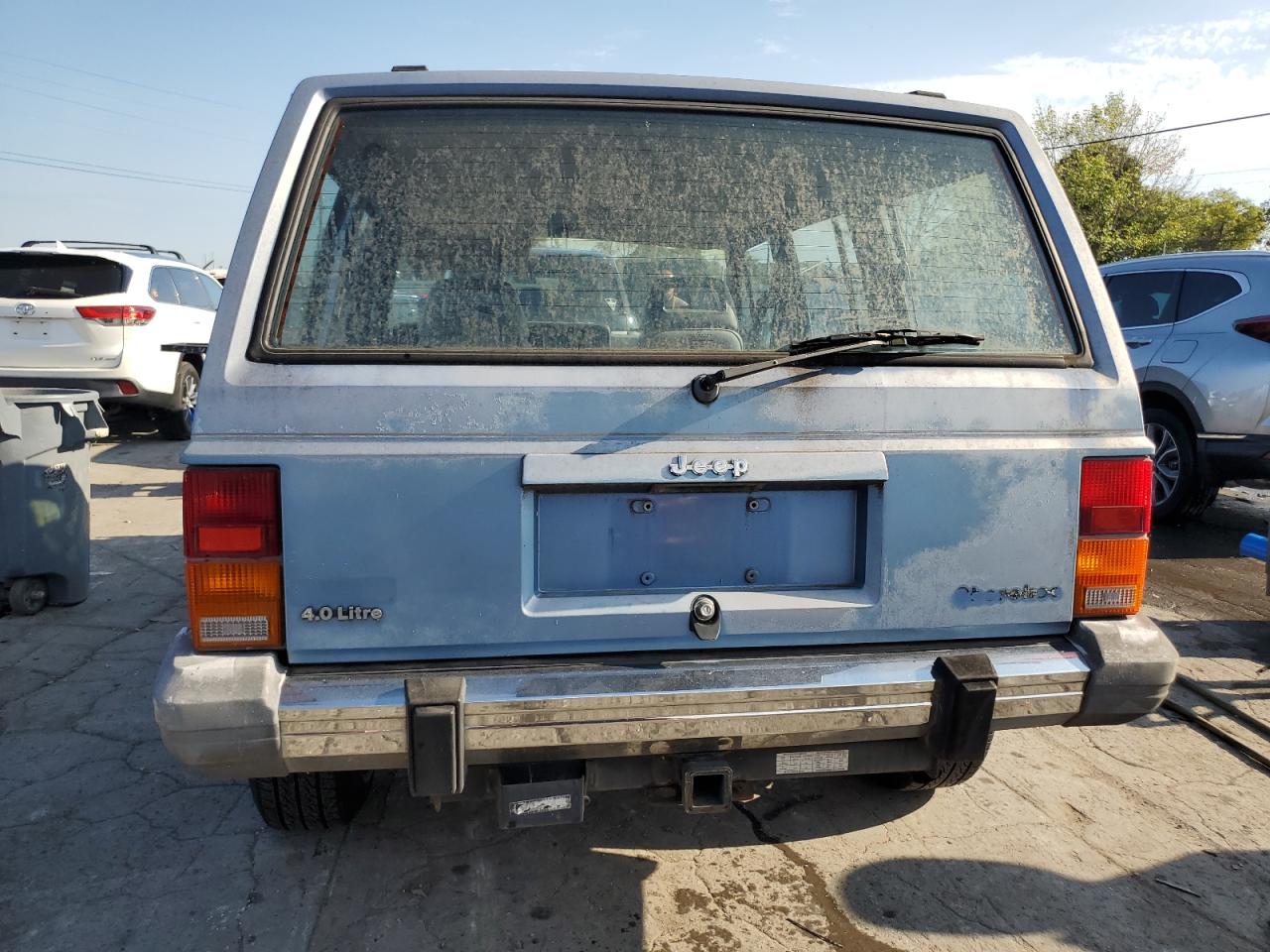 1990 Jeep Cherokee Laredo VIN: 1J4FJ58L6LL105058 Lot: 70254674