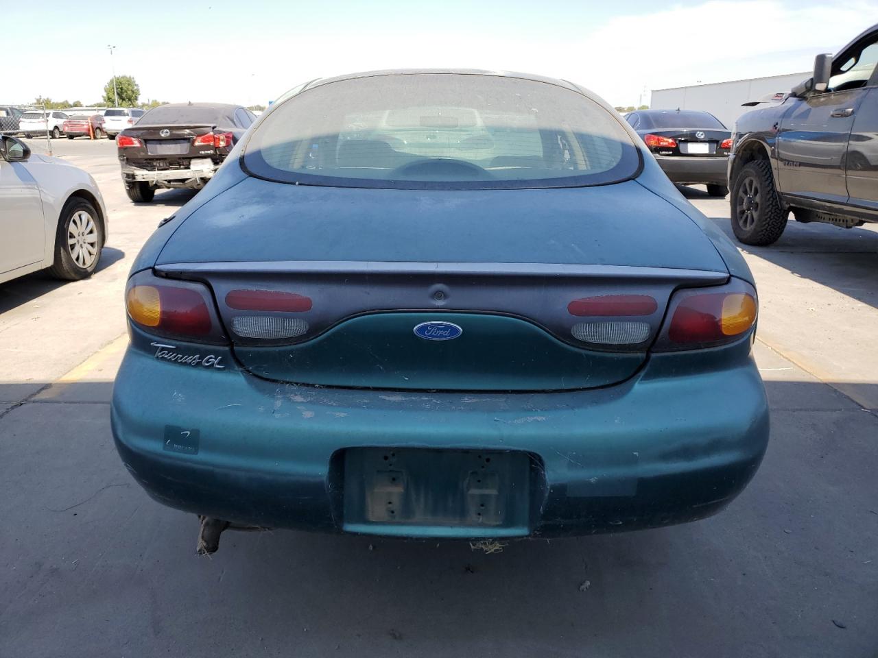 1997 Ford Taurus Gl VIN: 1FALP52U6VA203102 Lot: 69074044