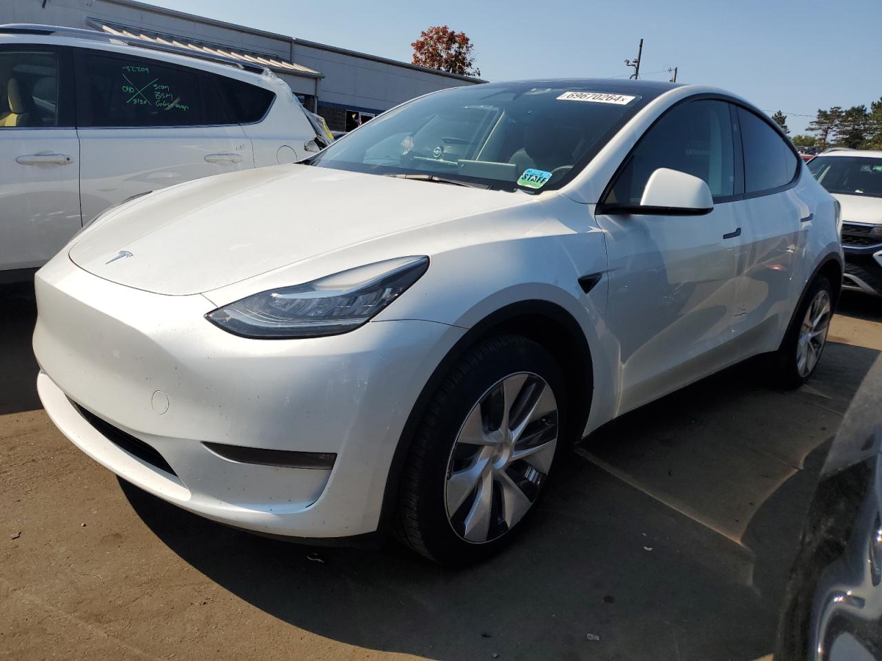 2023 Tesla Model Y VIN: 7SAYGDEE4PA136170 Lot: 69670264