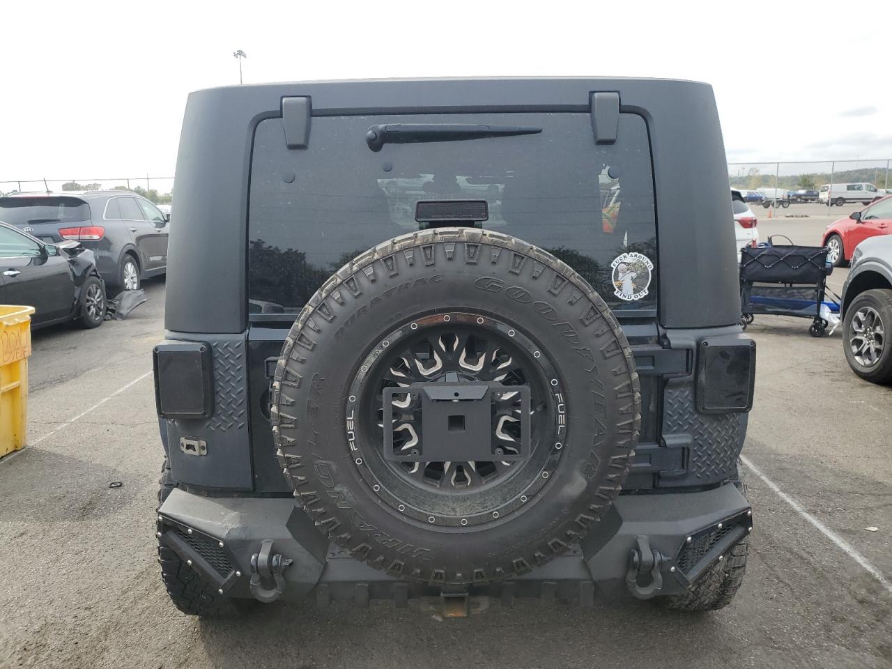 1J4BA3H14BL566632 2011 Jeep Wrangler Unlimited Sport