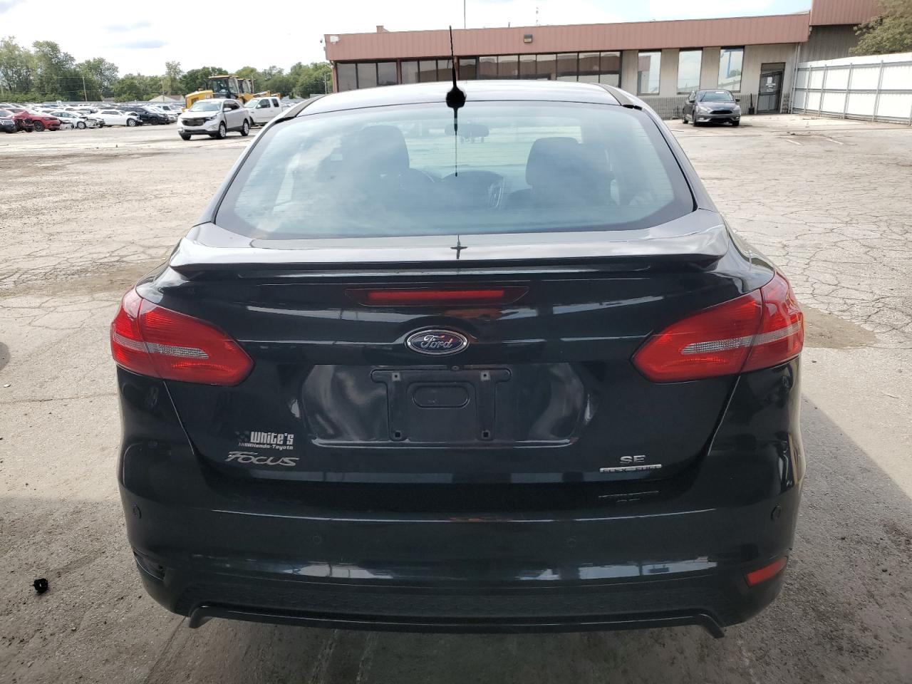 2015 Ford Focus Se VIN: 1FADP3F28FL379589 Lot: 69853204