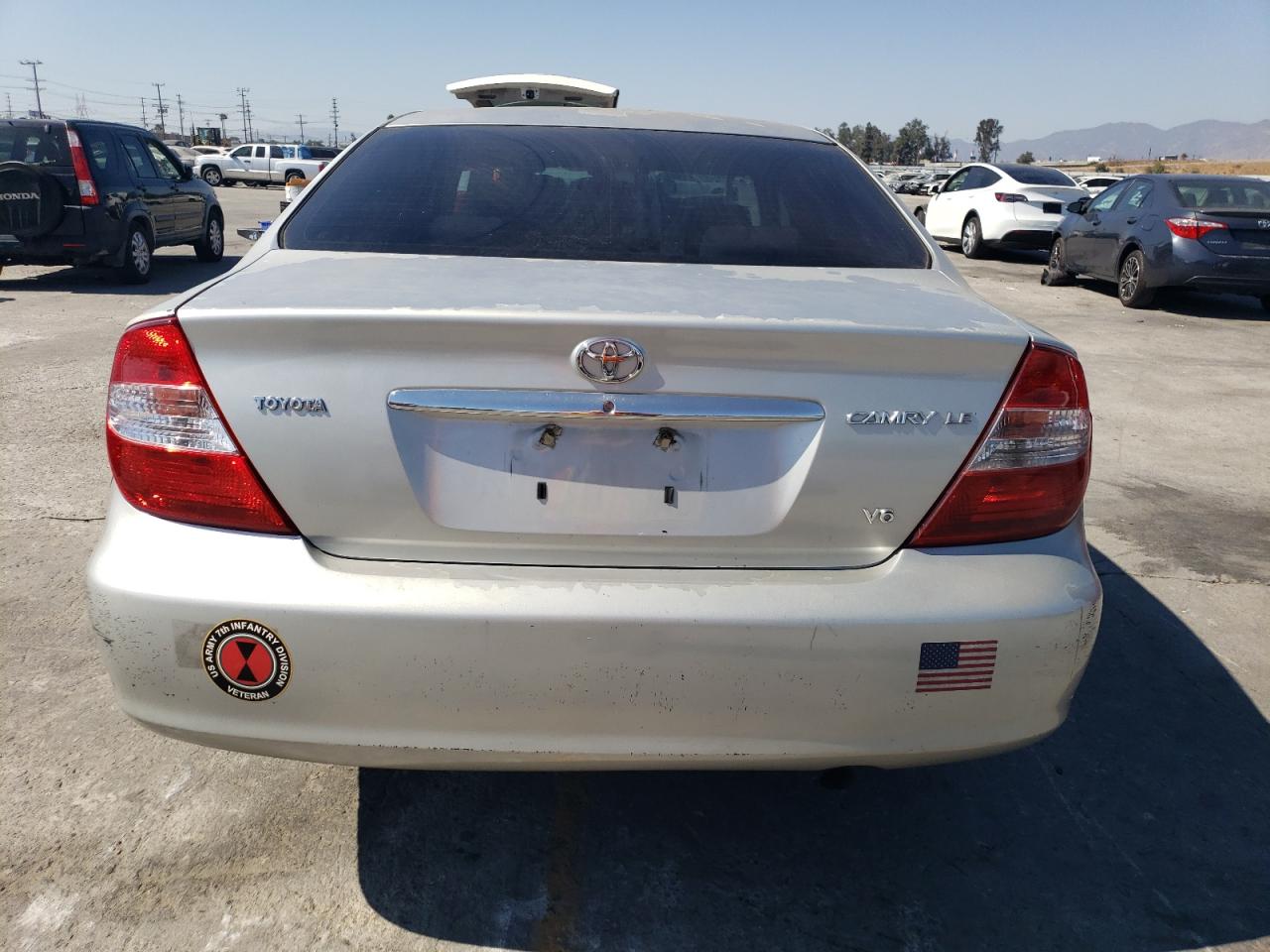 2003 Toyota Camry Le VIN: 4T1BF32K63U557818 Lot: 72574294