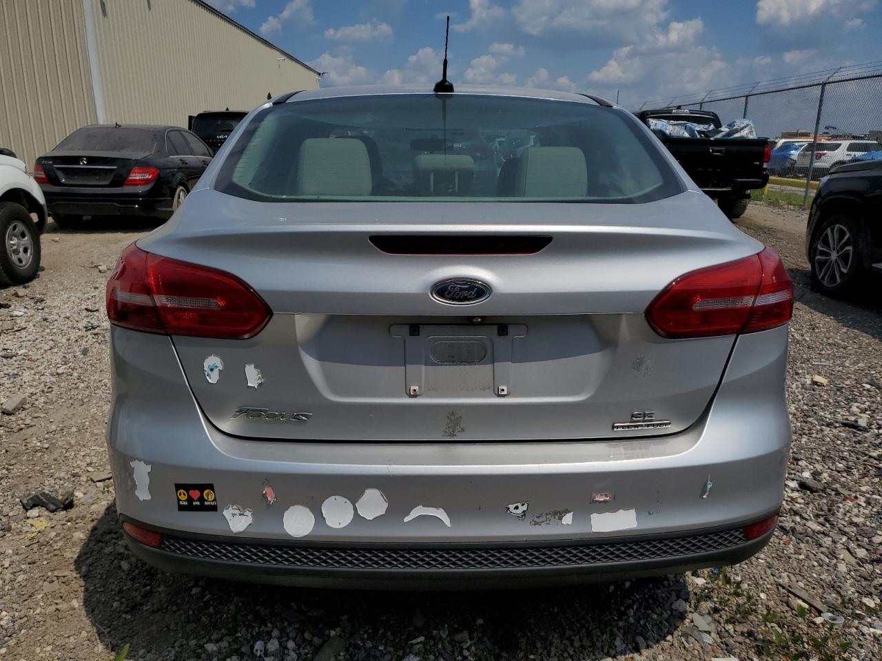 2016 Ford Focus Se VIN: 1FADP3F28GL313559 Lot: 71844394