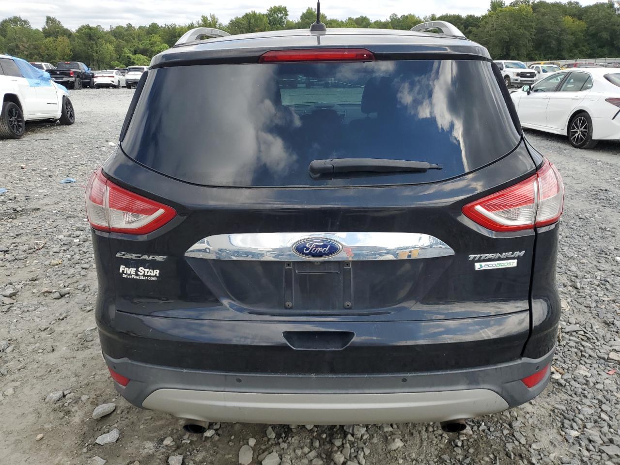 2015 Ford Escape Titanium VIN: 1FMCU0JX6FUA99028 Lot: 70653934