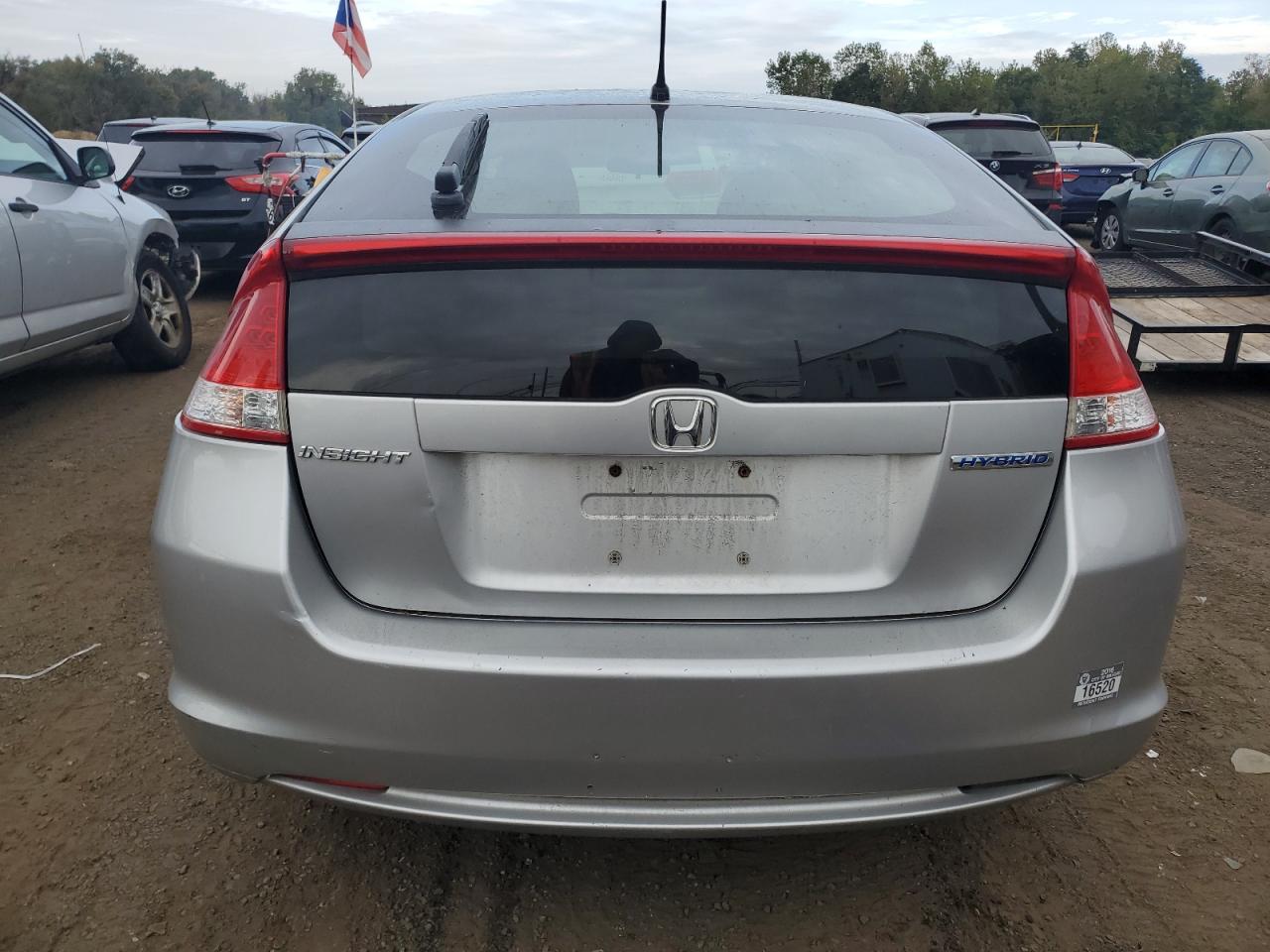 2010 Honda Insight Ex VIN: JHMZE2H75AS003874 Lot: 72360924