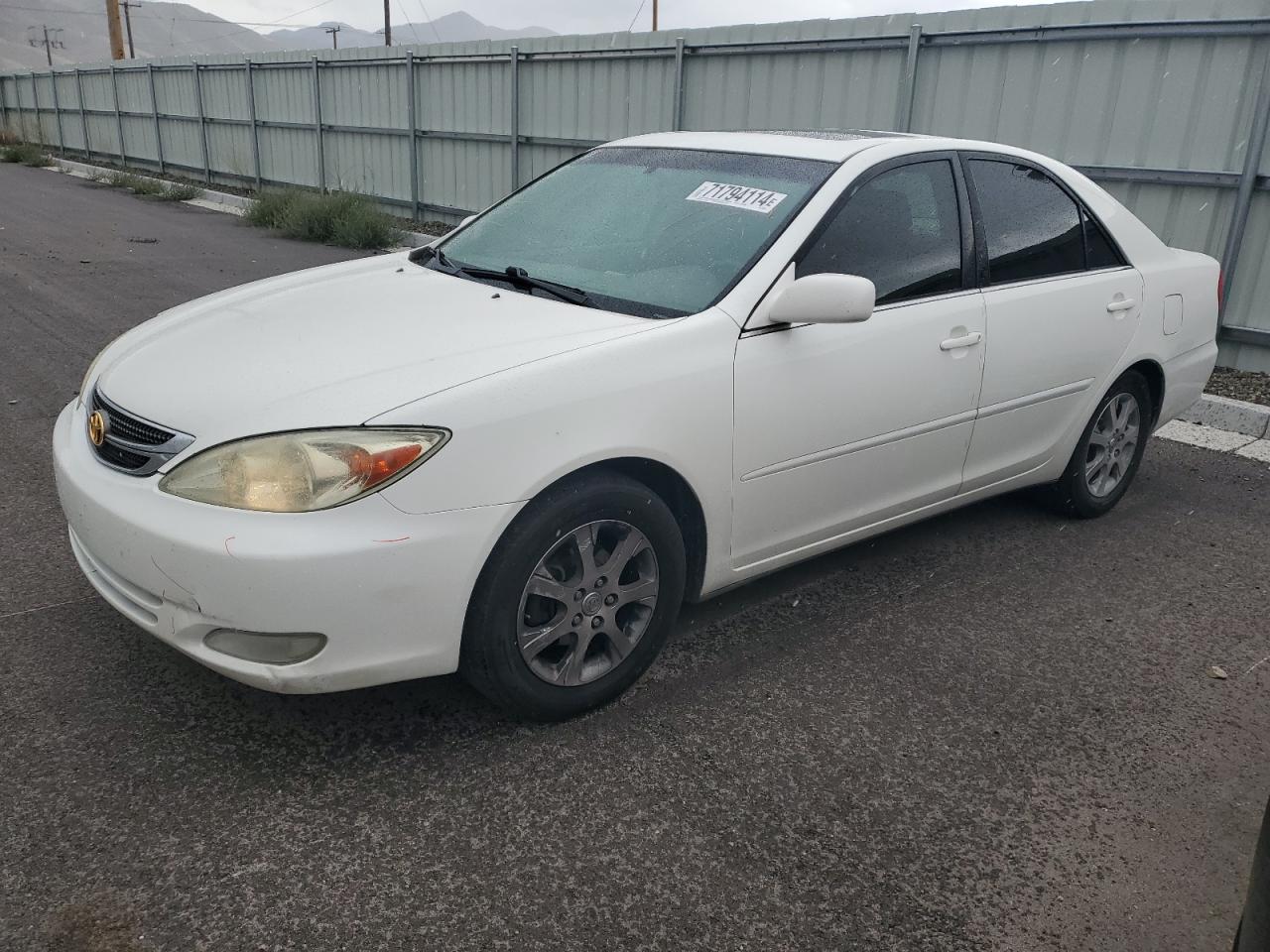 2004 Toyota Camry Le VIN: JTDBE30K940282321 Lot: 71794114