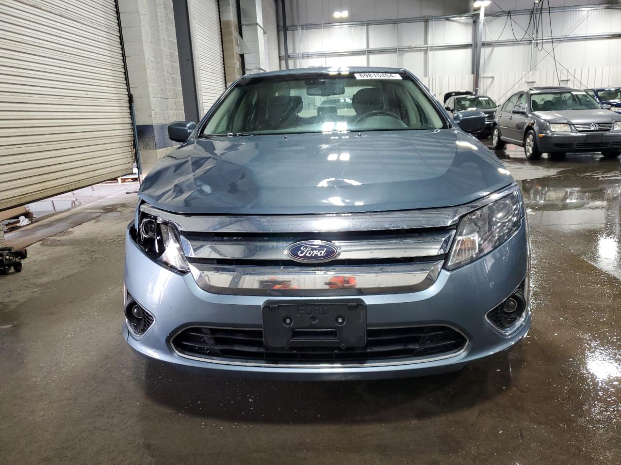 2011 Ford Fusion Hybrid VIN: 3FADP0L31BR234885 Lot: 69815454