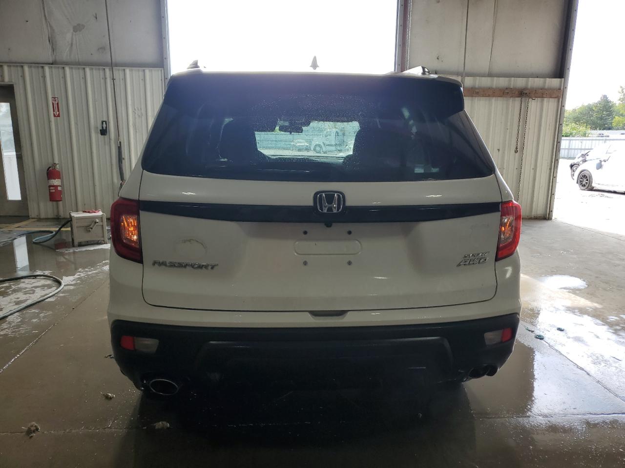 2021 Honda Passport Sport VIN: 5FNYF8H21MB044067 Lot: 70121284