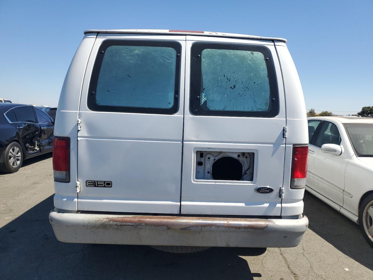 1999 Ford Econoline E150 Van VIN: 1FTRE1429XHA48540 Lot: 70322344