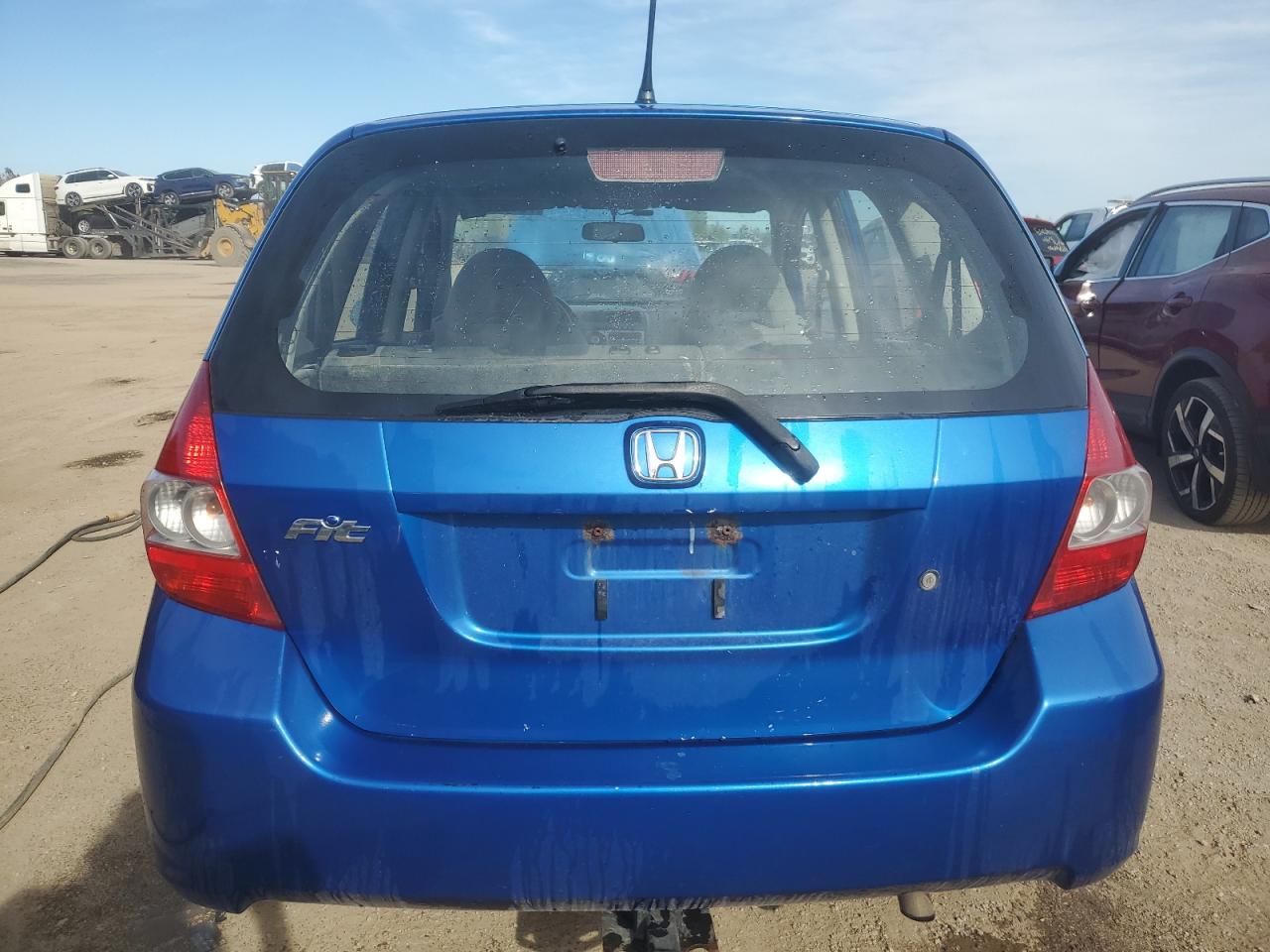 2007 Honda Fit Dx VIN: JHMGD38237S816532 Lot: 73489274