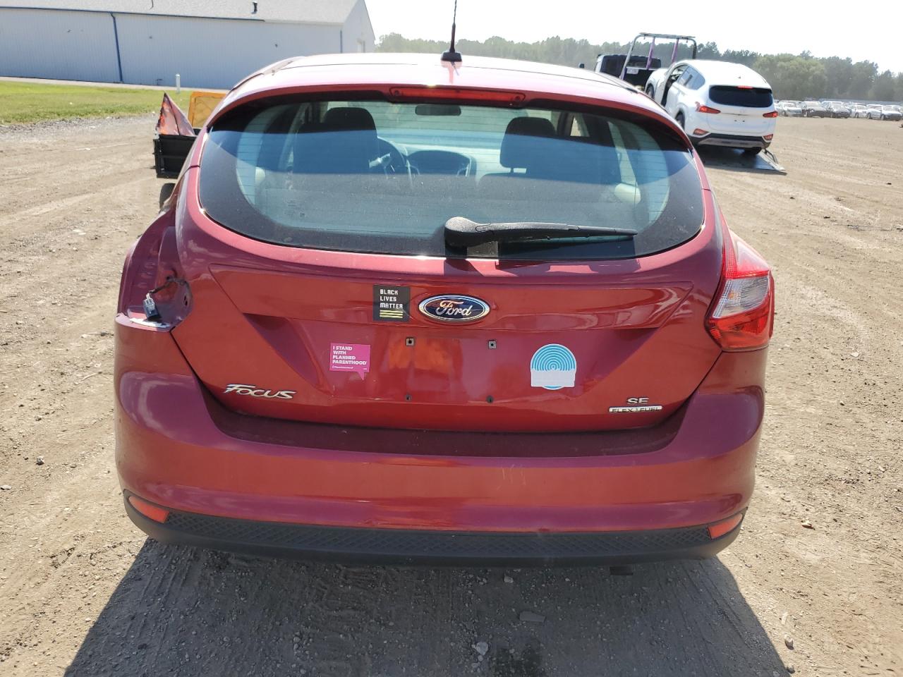 2014 Ford Focus Se VIN: 1FADP3K25EL459145 Lot: 71930034