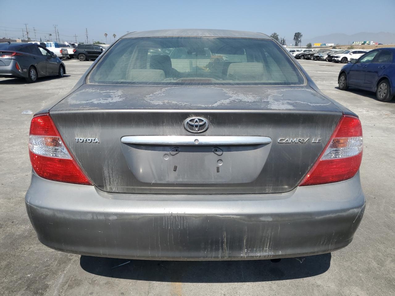 2003 Toyota Camry Le VIN: JTDBE32K730140044 Lot: 73023334