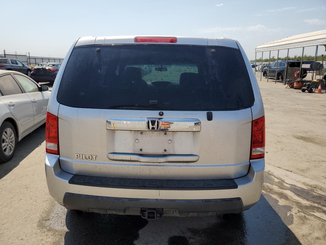 2011 Honda Pilot Lx VIN: 5FNYF3H27BB038130 Lot: 70437714