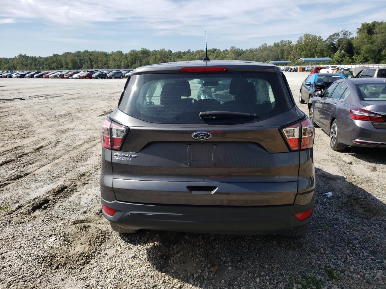 2017 Ford Escape S VIN: 1FMCU0F72HUD64121 Lot: 69540514