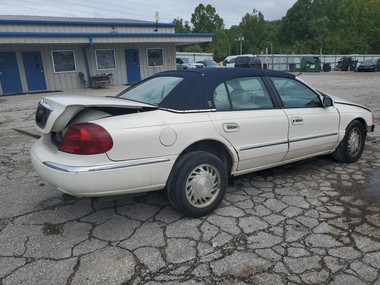 1998 Lincoln Continental VIN: 1LNFM97V8WY676657 Lot: 73322134