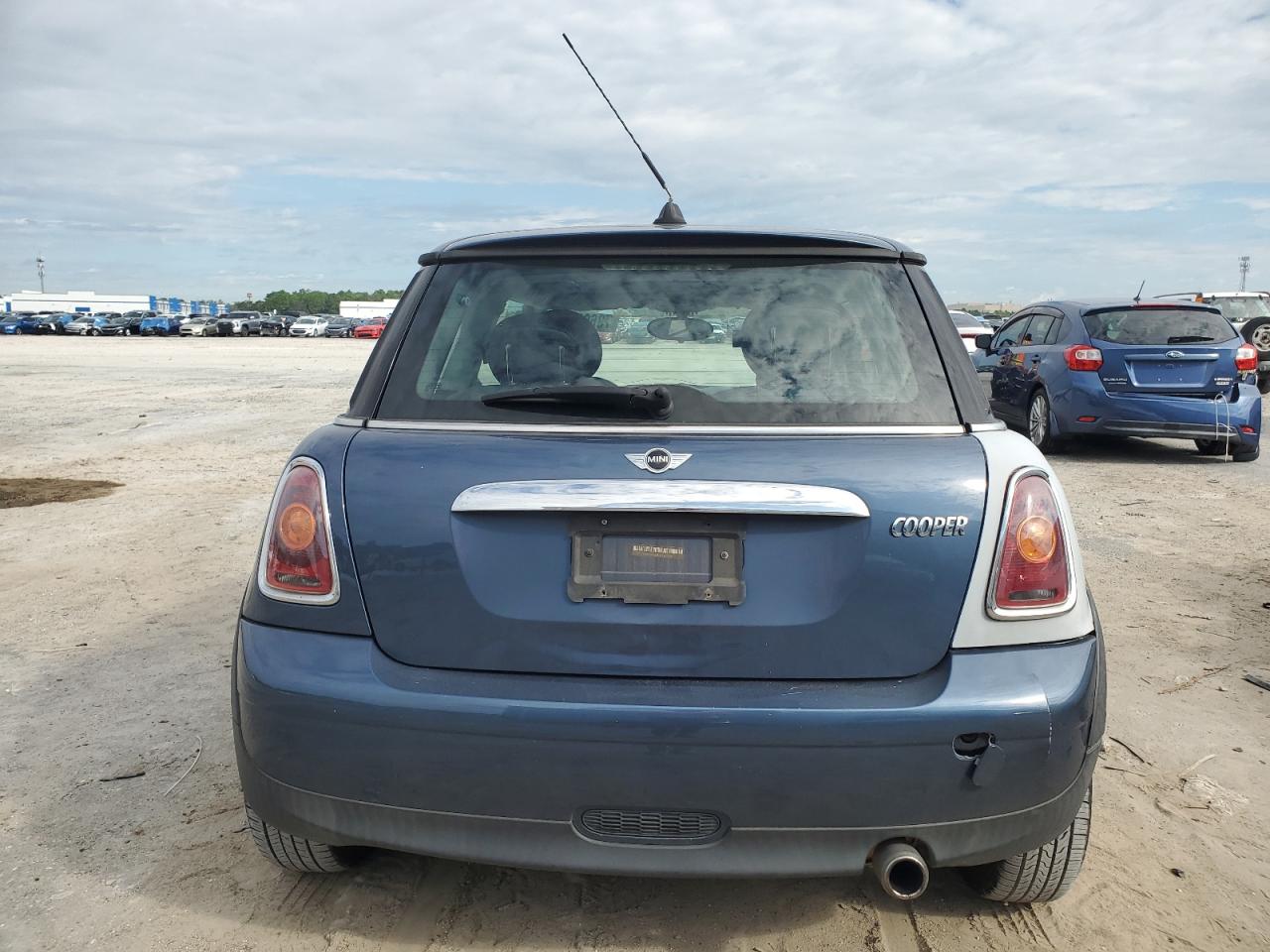 2009 Mini Cooper VIN: WMWMF33539TW78307 Lot: 73662784