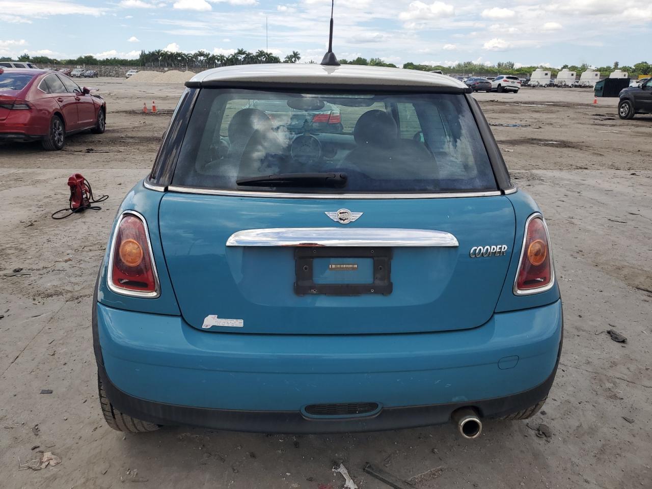 2009 Mini Cooper VIN: WMWMF335X9TW71404 Lot: 72199934