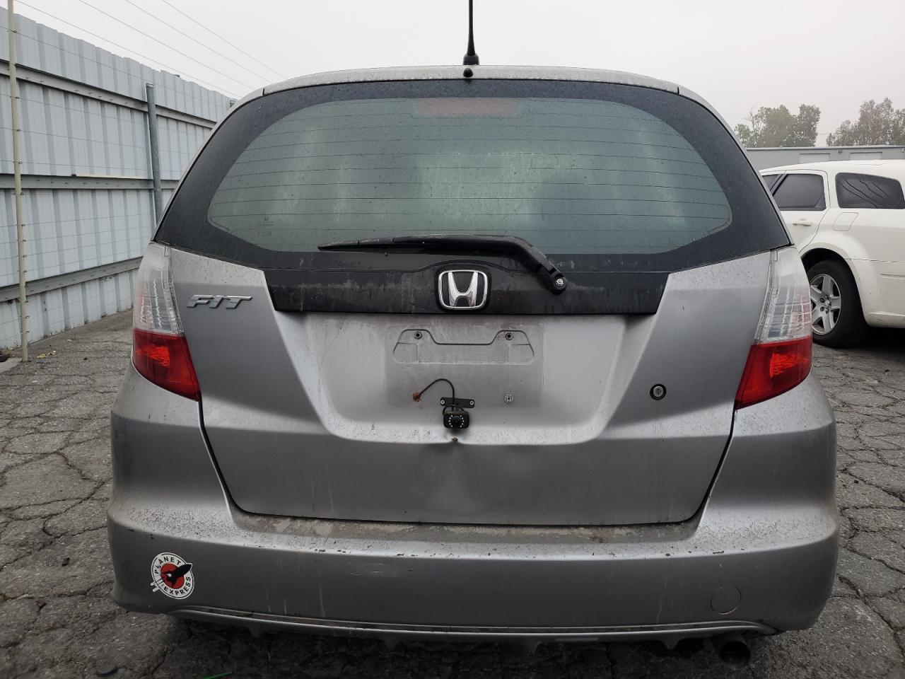 2010 Honda Fit VIN: JHMGE8G21AS002477 Lot: 72647374