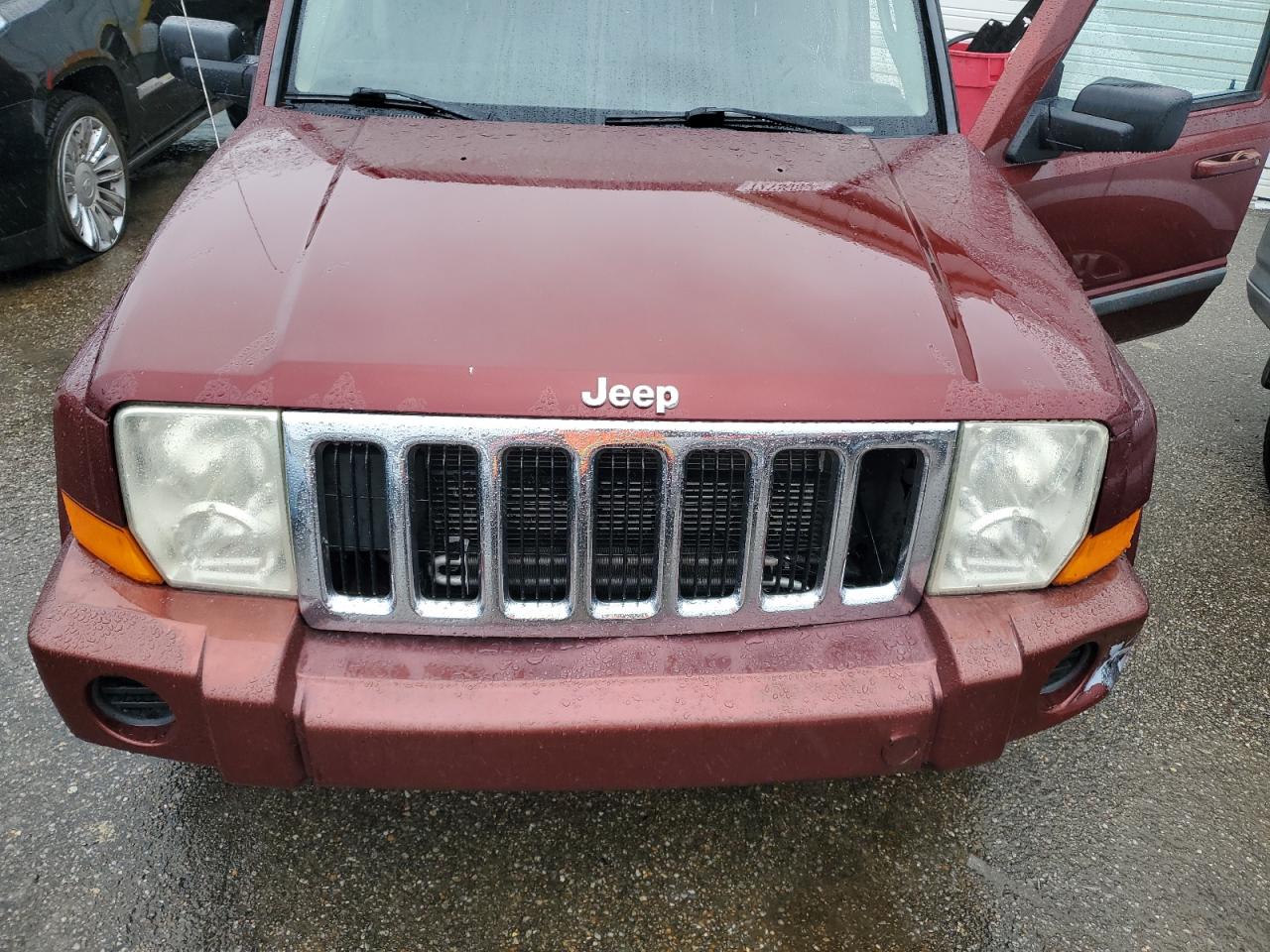 2007 Jeep Commander VIN: 1J8HH48KX7C603077 Lot: 72136304