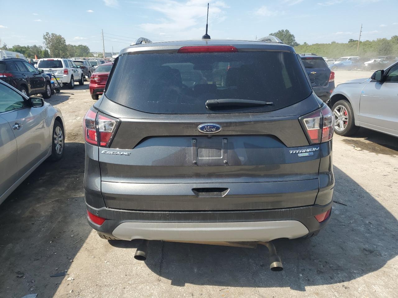 2017 Ford Escape Titanium VIN: 1FMCU9J90HUA76899 Lot: 71955534