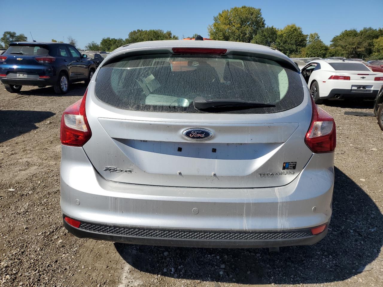 2012 Ford Focus Titanium VIN: 1FAHP3N27CL215409 Lot: 73094794