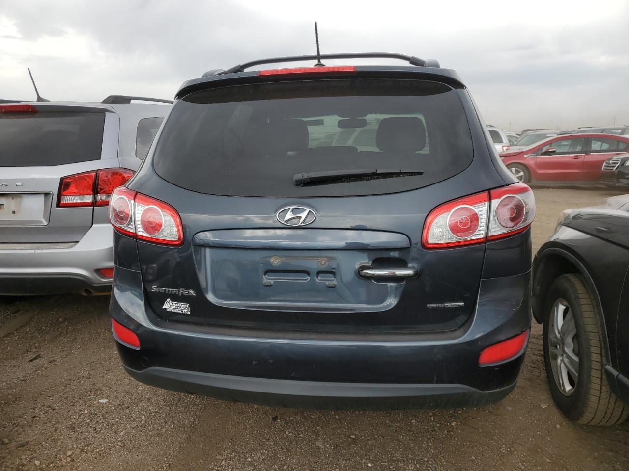 2012 Hyundai Santa Fe Limited VIN: 5XYZKDAG8CG111141 Lot: 70641934