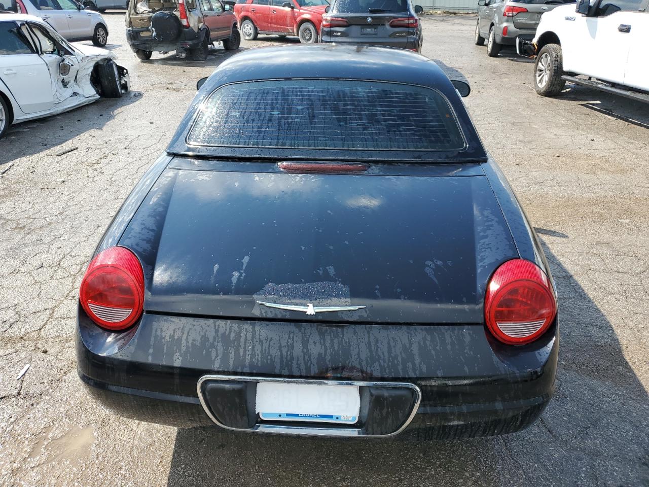 2002 Ford Thunderbird VIN: 1FAHP60A12Y104789 Lot: 70710474