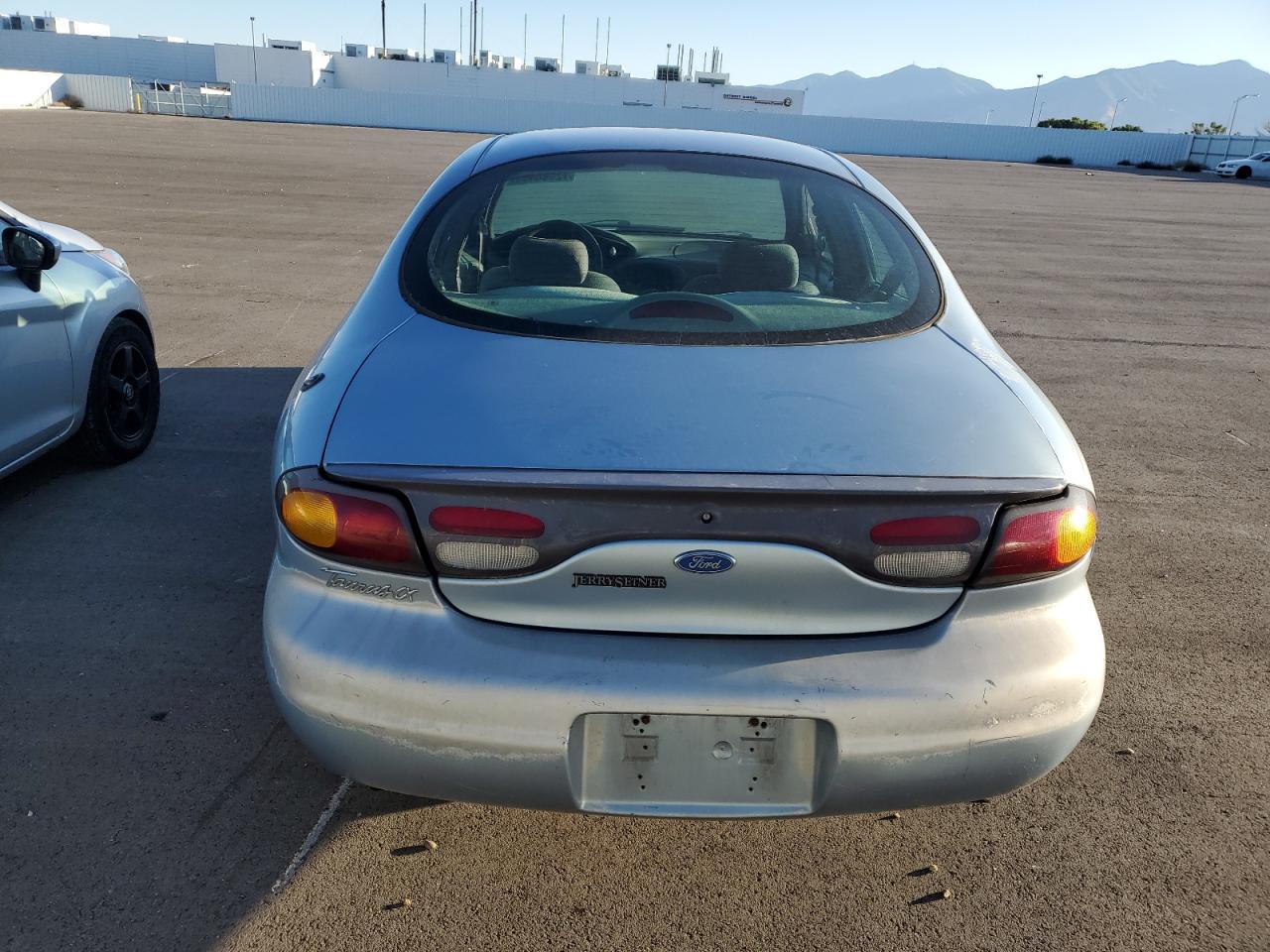 1997 Ford Taurus Lx VIN: 1FALP53S7VA138581 Lot: 72598434