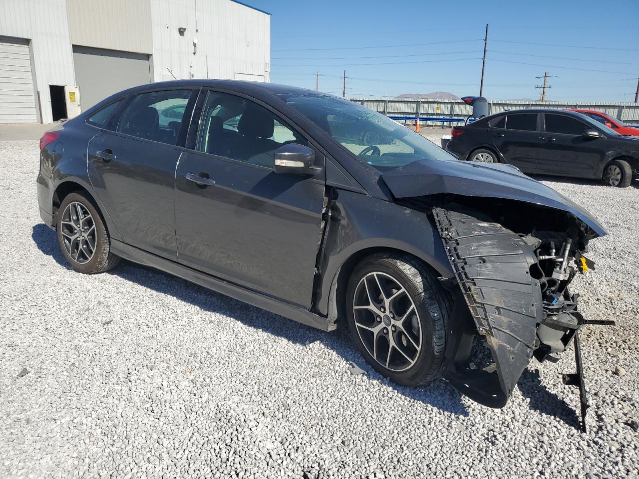 VIN 1FADP3F27FL241784 2015 FORD FOCUS no.4