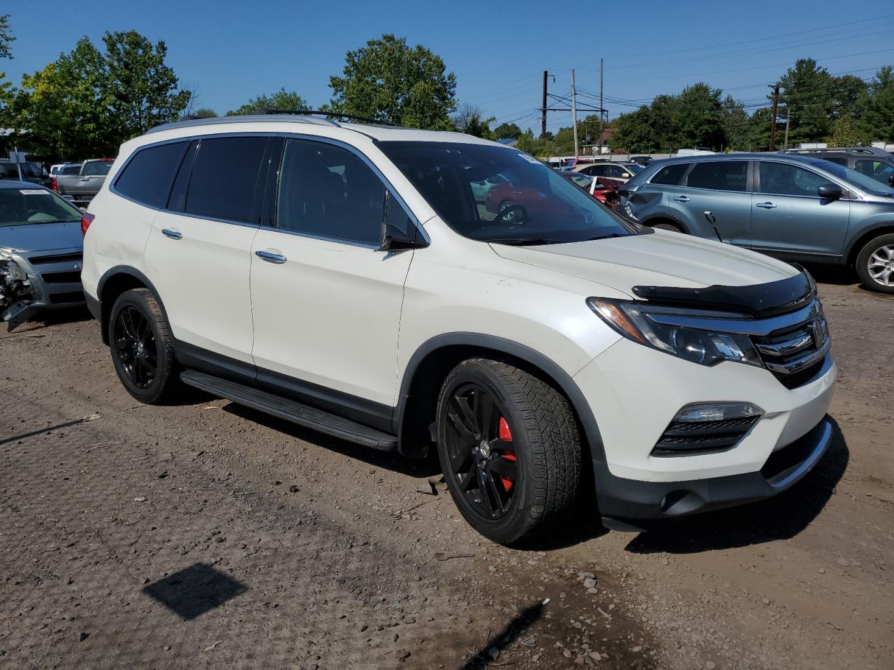 2017 Honda Pilot Elite VIN: 5FNYF6H00HB001557 Lot: 69944644