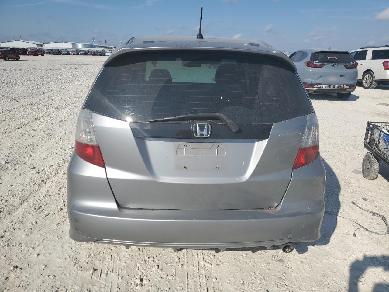 2009 Honda Fit Sport VIN: JHMGE88439S022211 Lot: 72419104