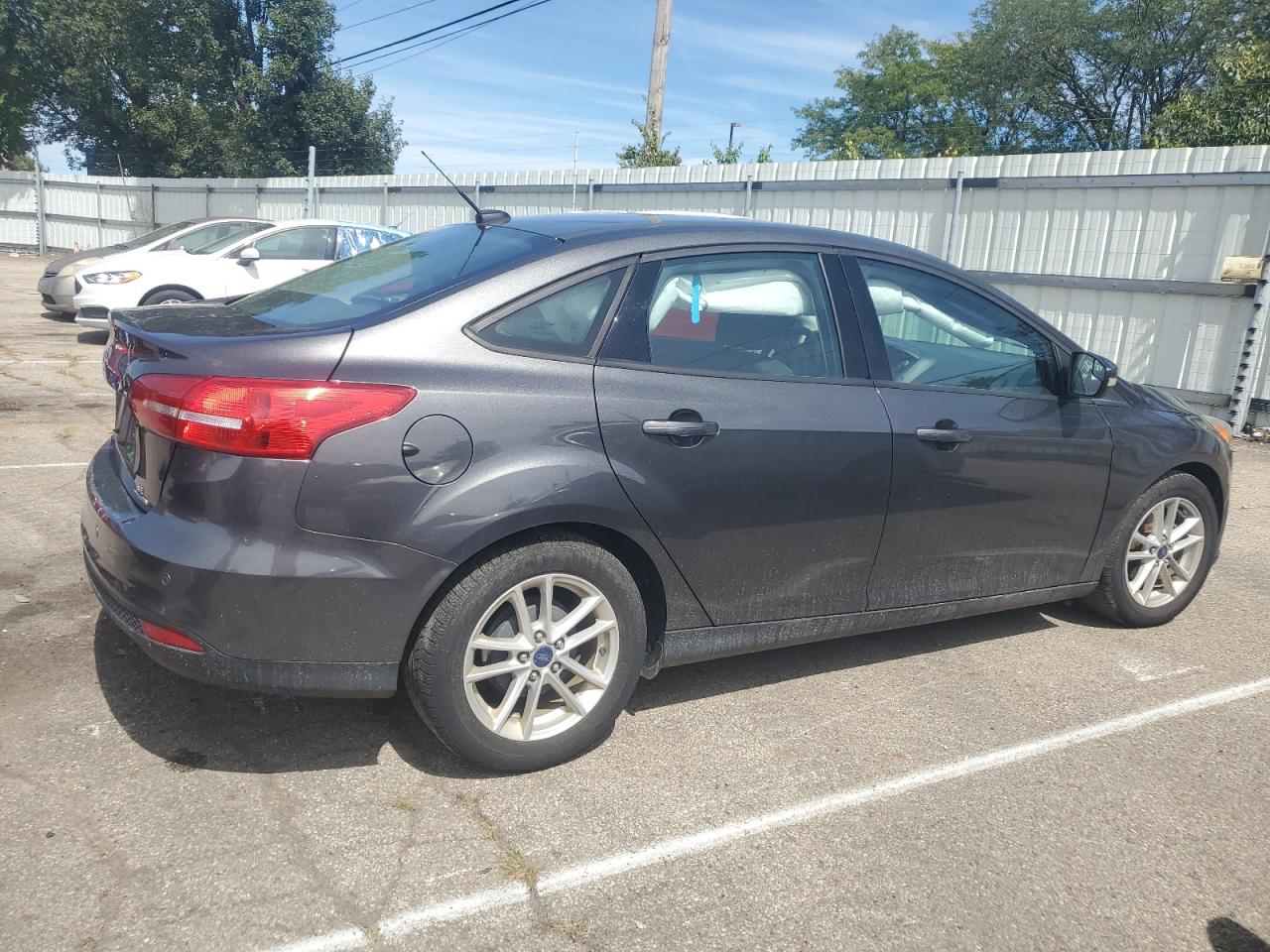 2016 Ford Focus Se VIN: 1FADP3F2XGL403781 Lot: 69950024