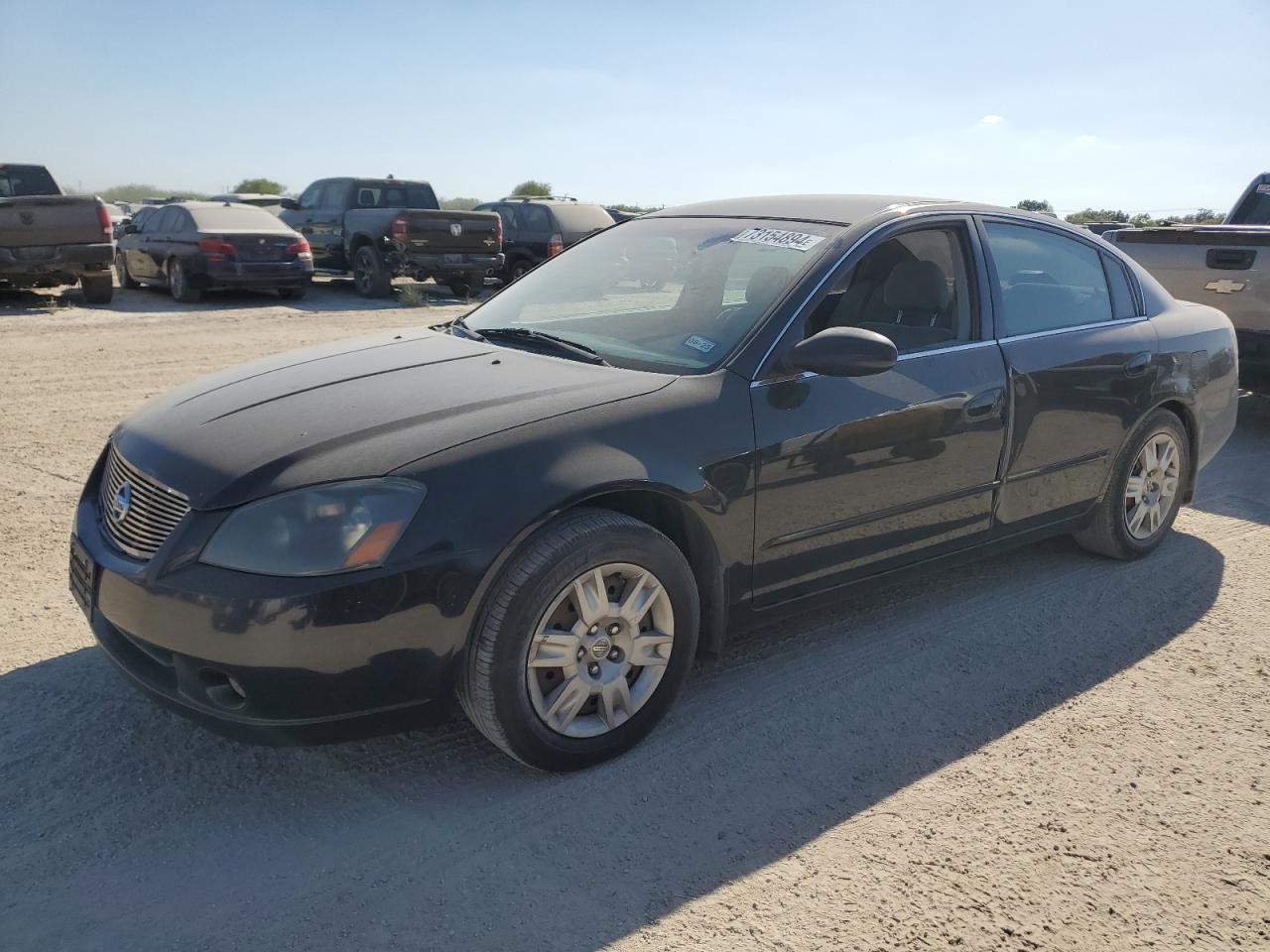 2005 Nissan Altima S black sedan gas 1N4AL11D85N409799 photo #1