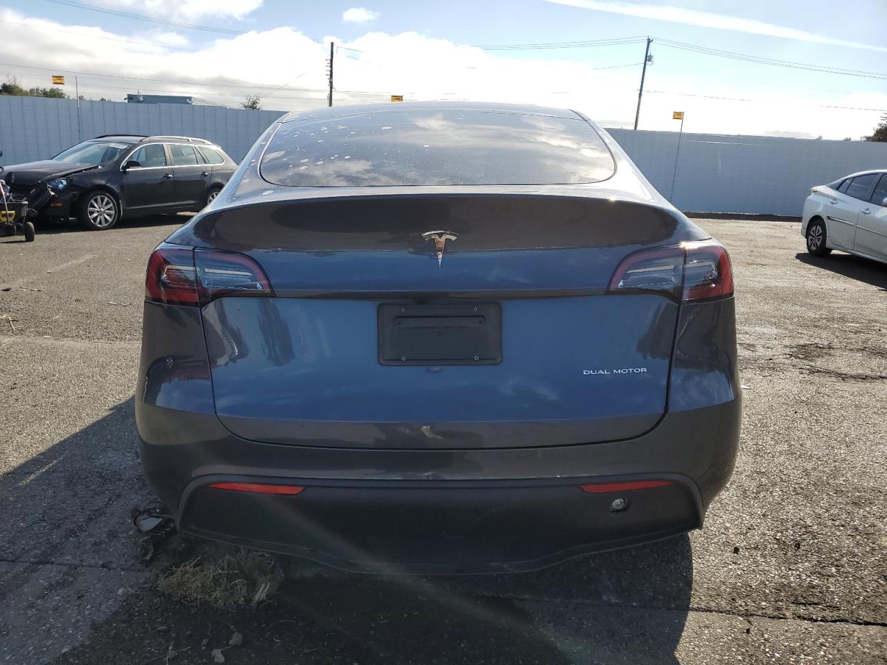 2023 Tesla Model Y VIN: 7SAYGAEE1PF897207 Lot: 71113144