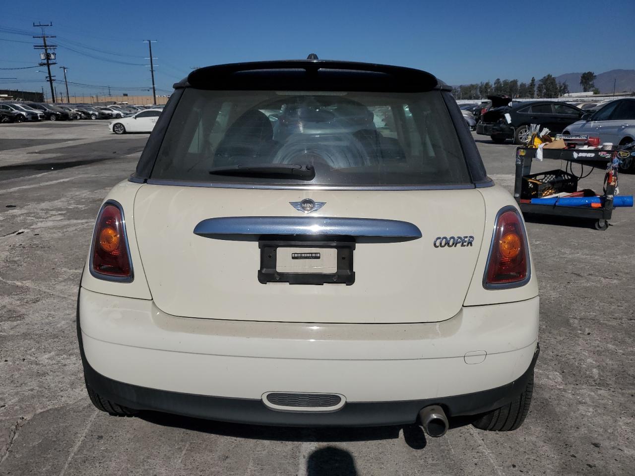 2009 Mini Cooper VIN: WMWMF33579TW78679 Lot: 72381044